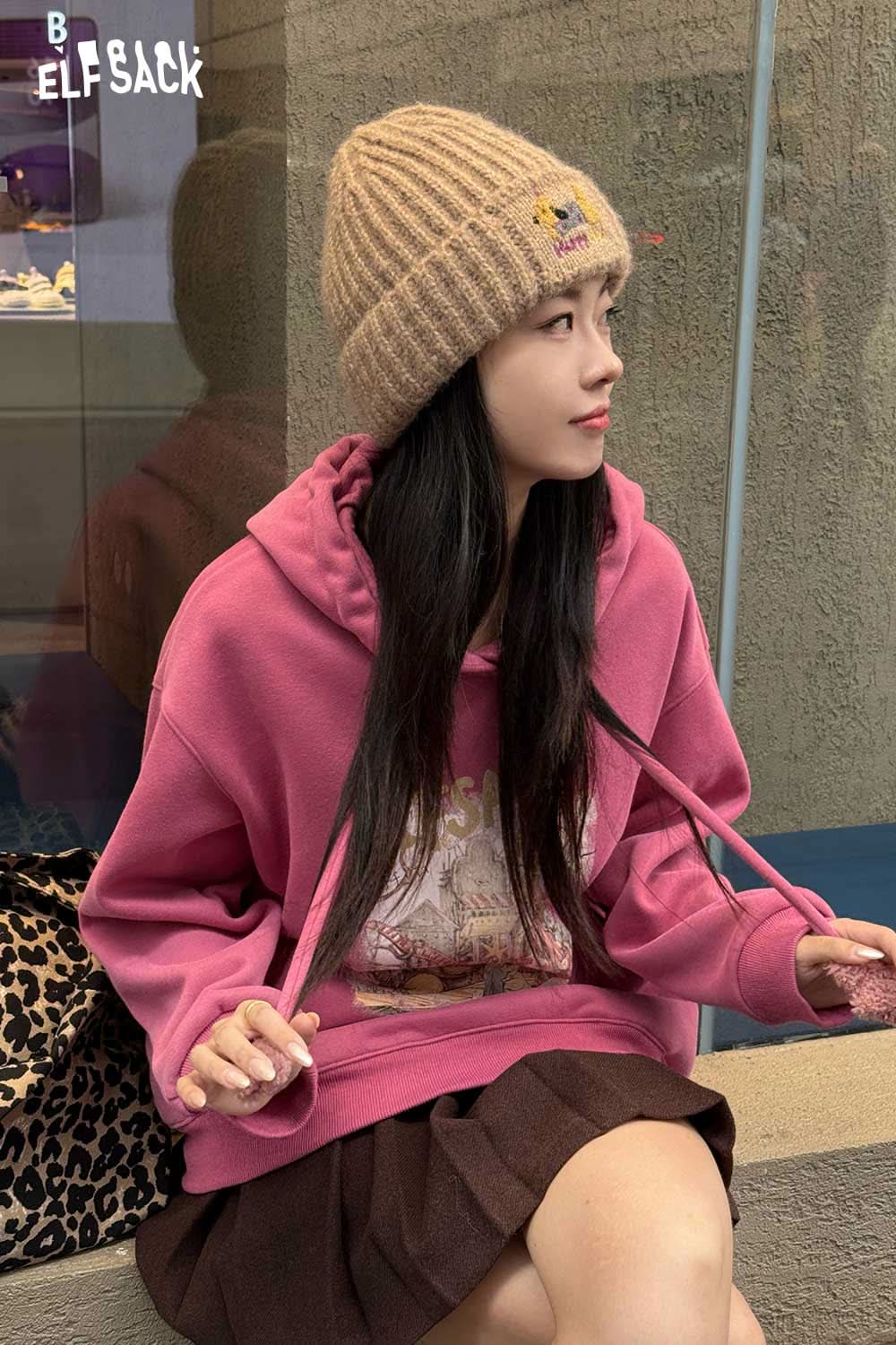 ELFSACK soft dog embroidered hat paired with a pink hoodie for casual street style