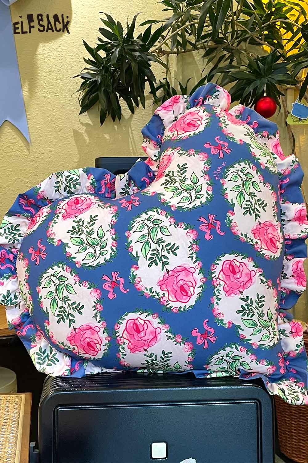 ELFSACK heart shaped rose pillow in blue floral print with pink roses and ruffled edge for decor