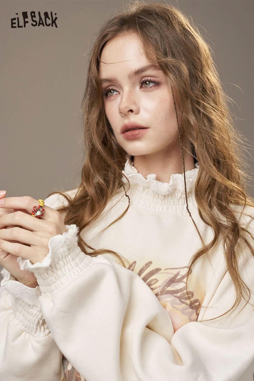 ELFSACK floral print high-neck top for women with gathered sleeves and a delicate design