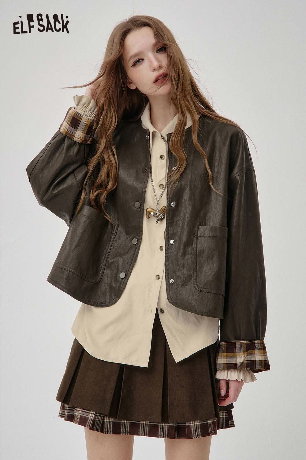ELFSACK women's soft lapel collar shirt layered under a stylish leather jacket