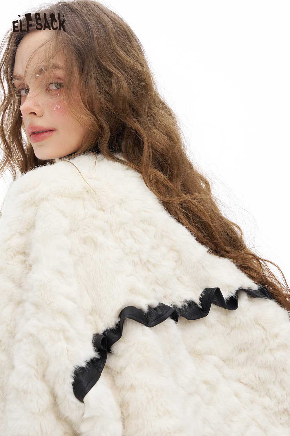 Soft minimalist short coat for women by ELFSACK featuring a textured design and stylish ruffled detail