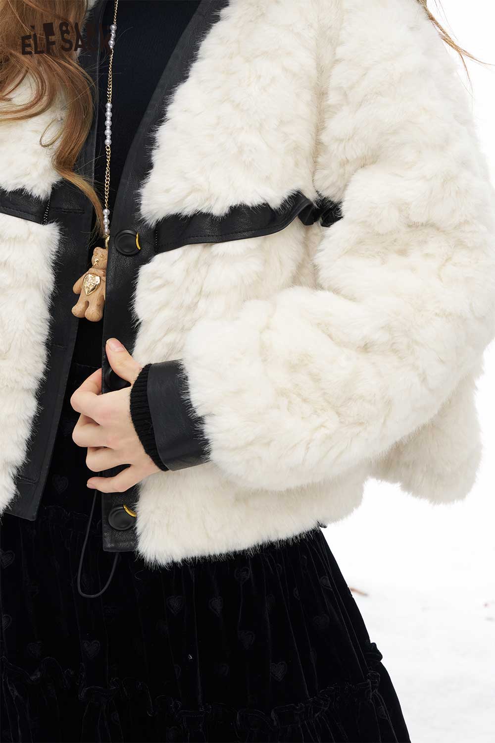 ELFSACK soft minimalist short coat for women with a cozy faux fur design and stylish black accents