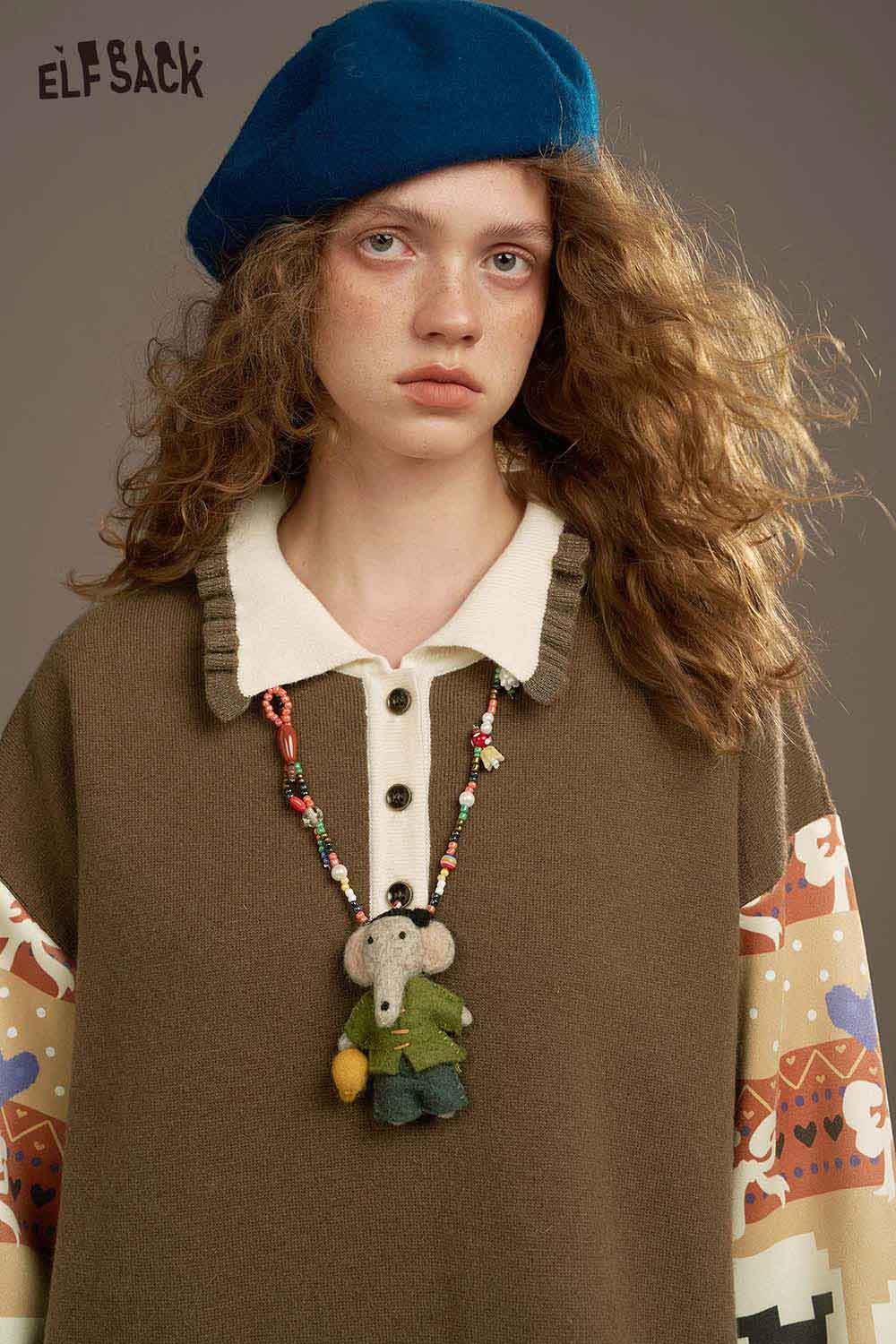 ELFSACK soft patchwork sleeve dress with a stylish collar and playful design