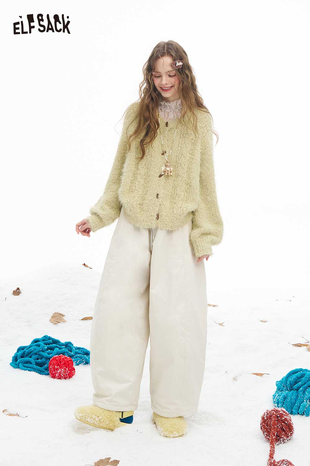 ELFSACK soft plush button sweater in pastel yellow with a cozy fit and stylish buttons