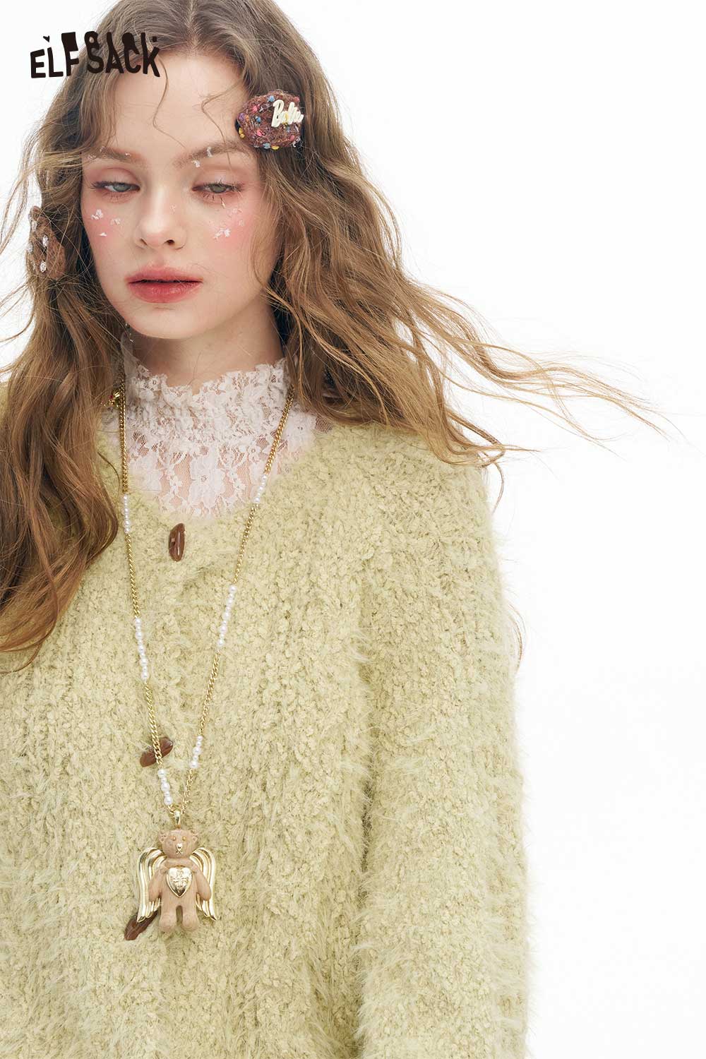 ELFSACK soft plush button sweater in pastel green, perfect for cozy winter outfits