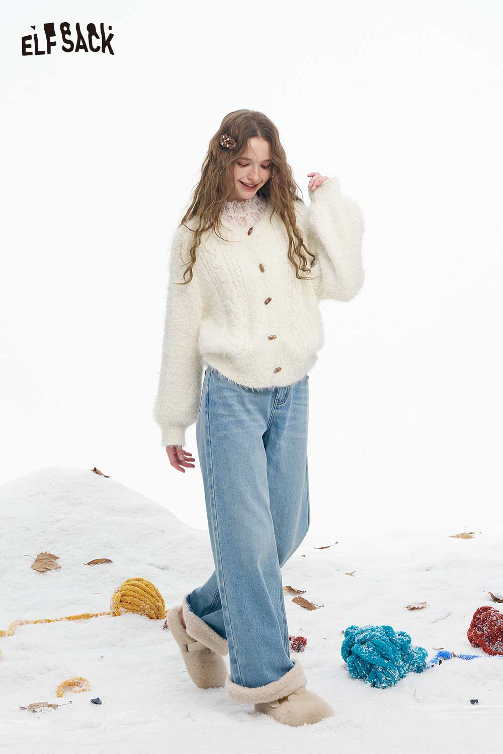 ELFSACK soft plush button sweater in cream, styled with wide-leg denim and cozy slippers