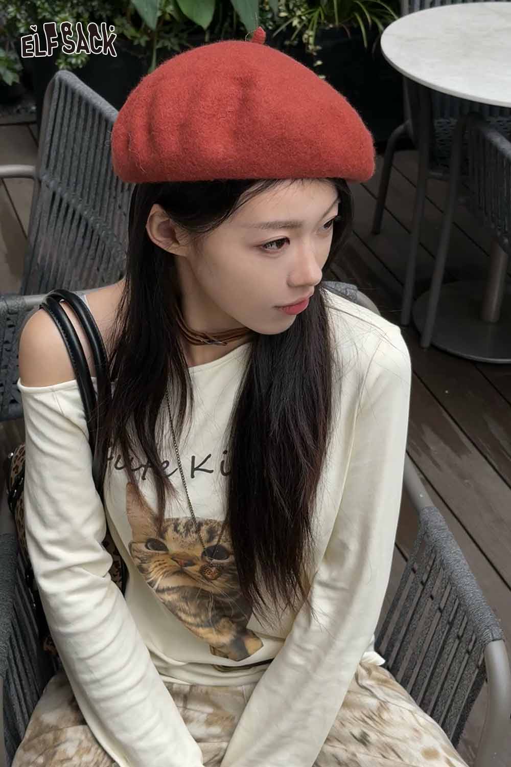 Soft pumpkin beanie for women styled with a casual outfit, featuring a cozy look for autumn fashion.