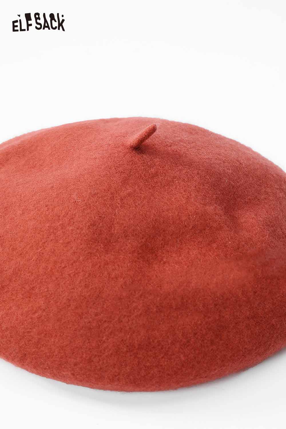 Soft pumpkin beanie for women in a warm rust color, perfect for autumn fashion