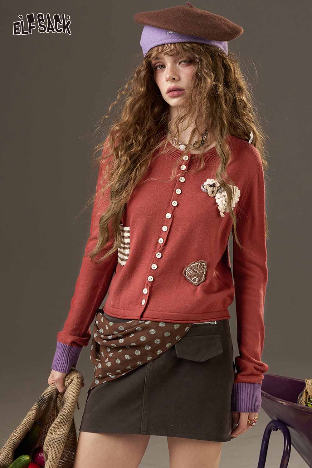 ELFSACK zebra print knit sweater for women with stylish button details and unique patches