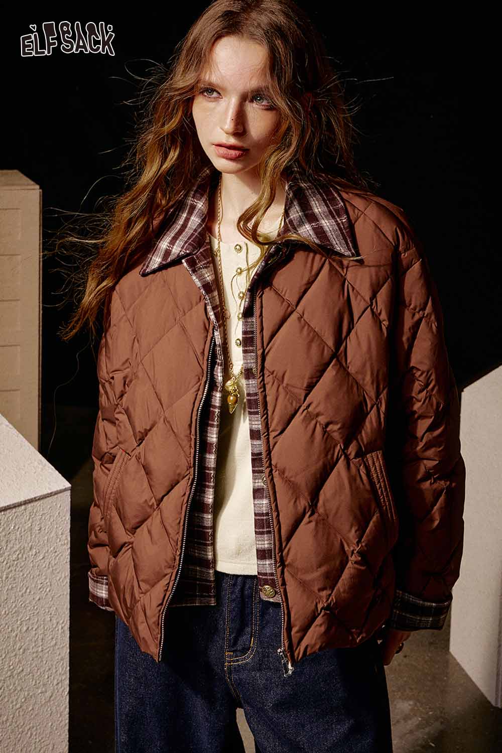 ELFSACK soft spliced sleeve long sleeve tshirt layered under a stylish quilted jacket