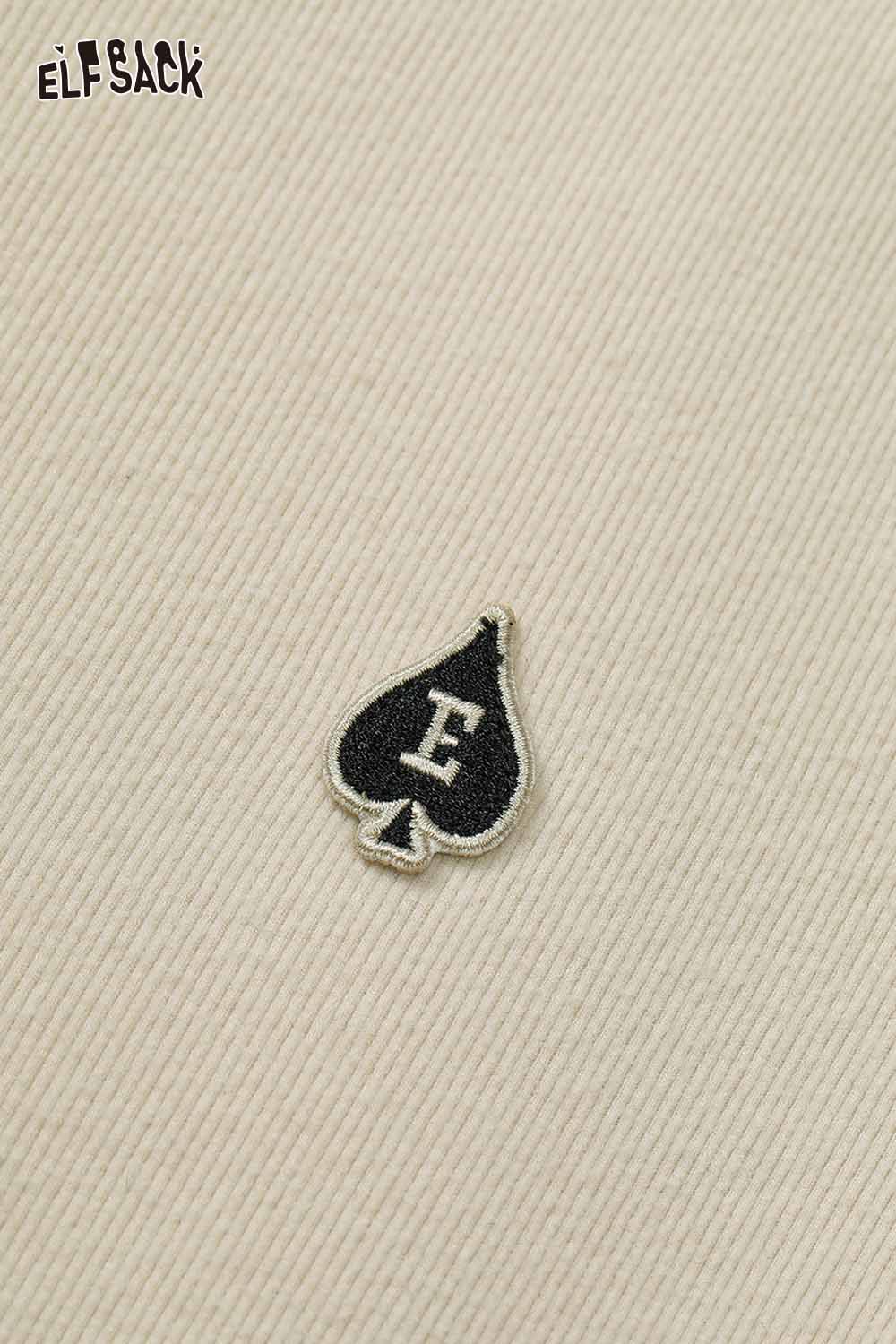 ELFSACK soft spliced sleeve long sleeve tshirt with unique spade logo detail