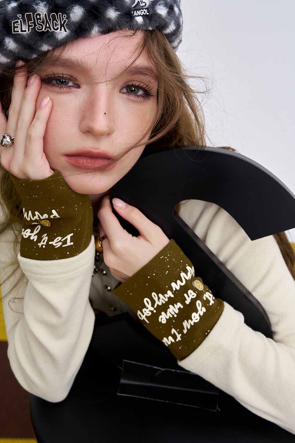 ELFSACK soft spliced sleeve long sleeve tshirt featuring stylish cuffs and a comfortable fit