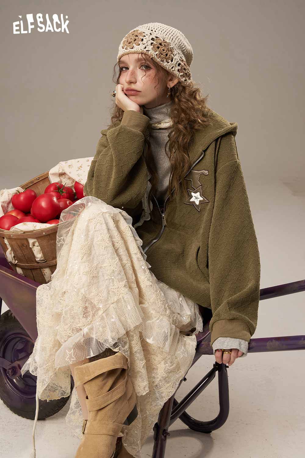 ELFSACK soft star hooded jacket for women paired with a floral skirt and cozy accessories