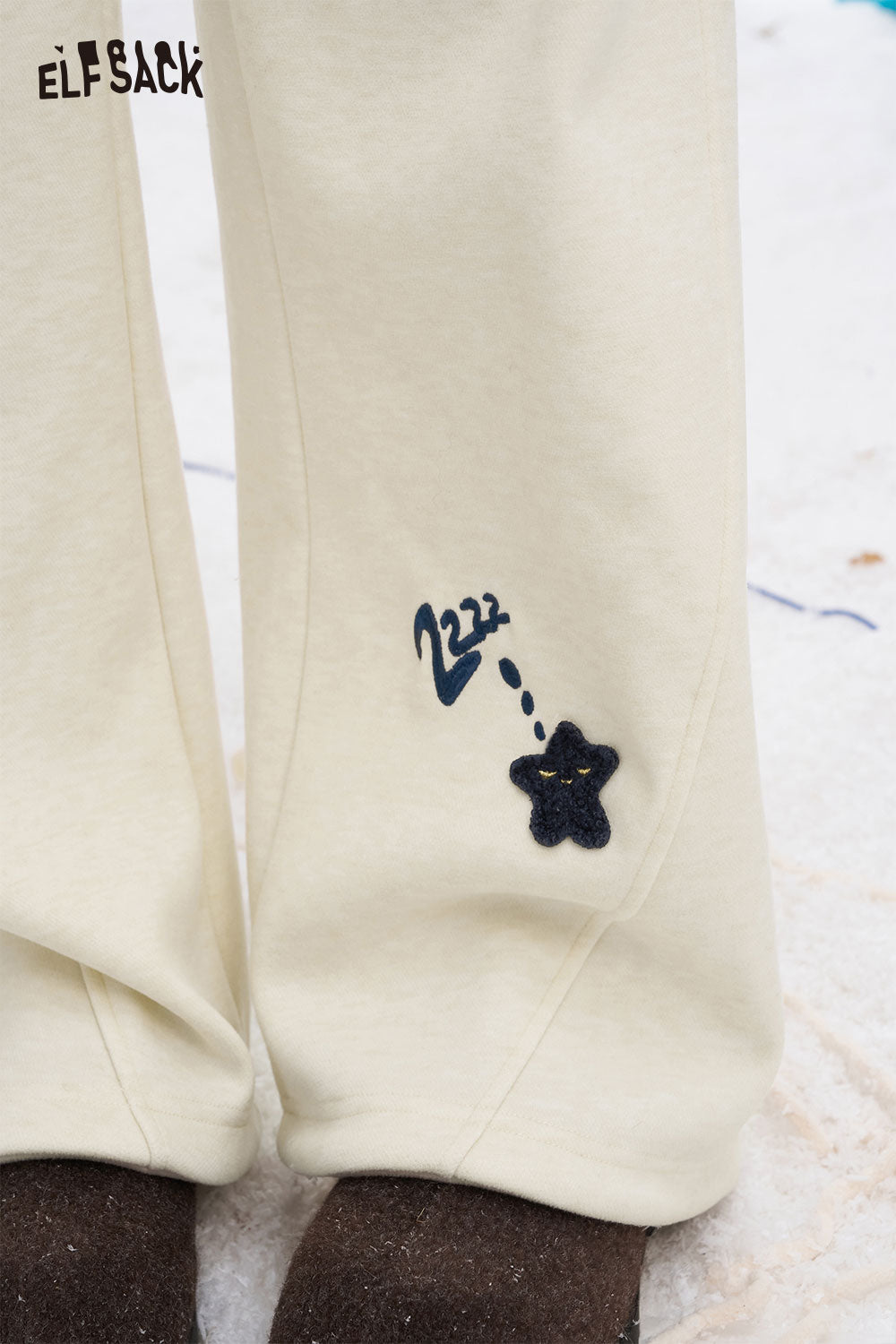 ELFSACK star graphic floor length pants in cream featuring unique star embroidery design