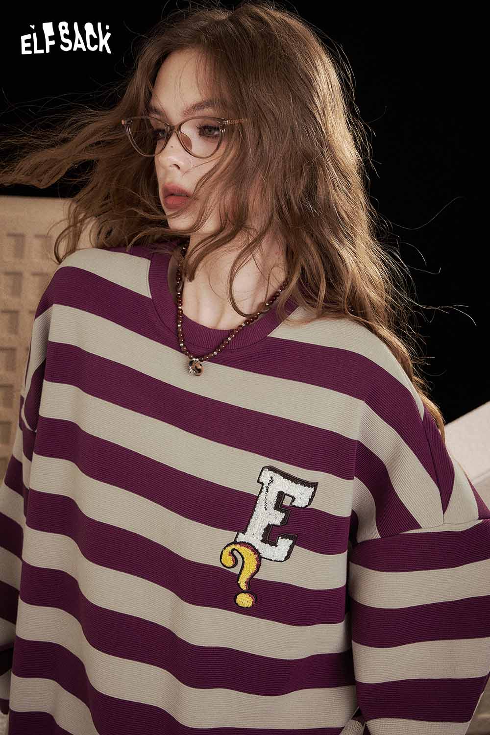 Striped embroidered sweatshirt women by ELFSACK featuring a bold E design on a classic gray and purple stripe