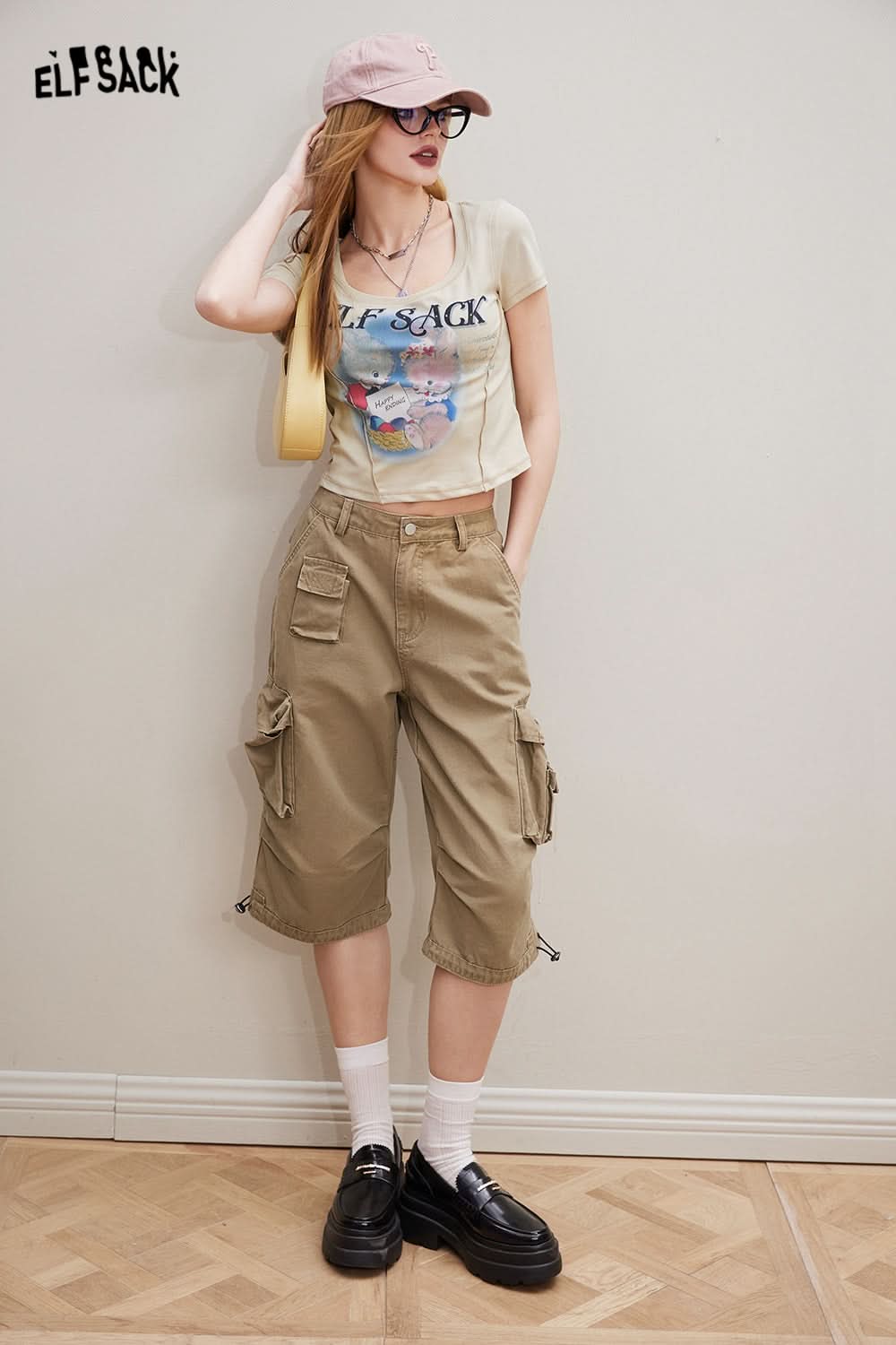 ELFSACK Sweet & Spicy short sleeve T-shirt worn by model with casual khaki cargo pants and black shoes