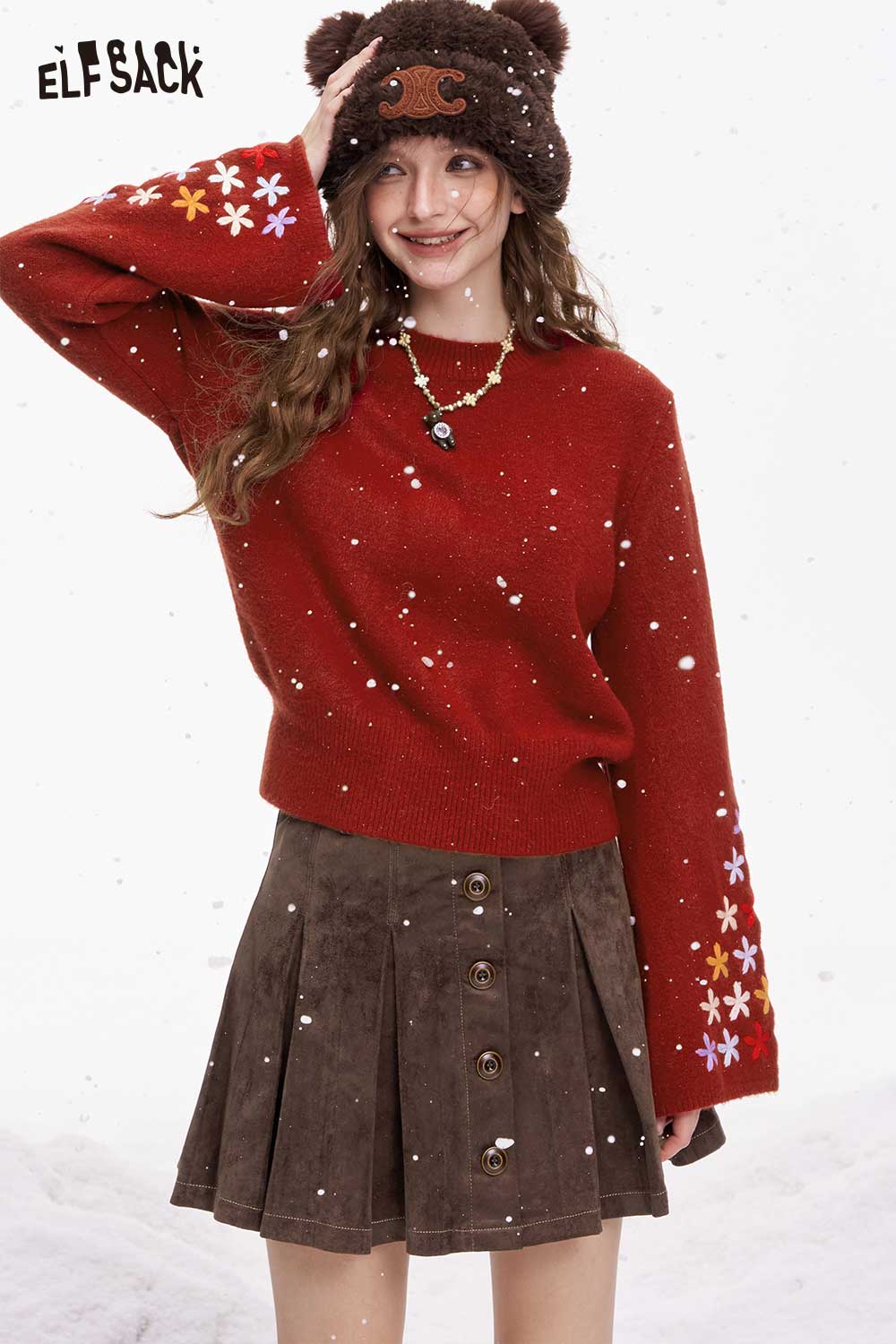ELFSACK cropped floral sleeve sweater in red with colorful flower details, styled with a brown skirt