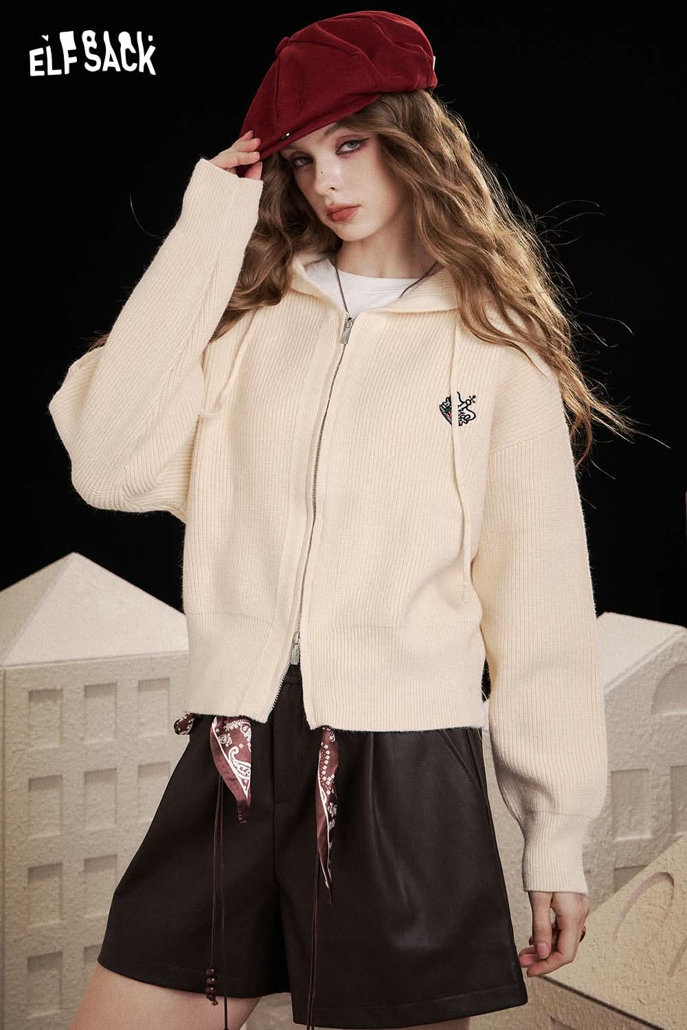 ELFSACK crown embroidered knit sweater in cream color with a relaxed fit and hooded design