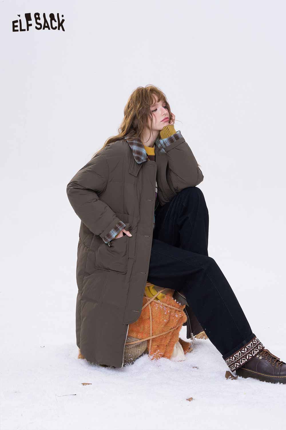 ELFSACK minimalist long down coat for women in brown with a relaxed fit and oversized pockets