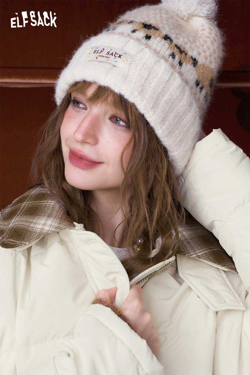 ELFSACK minimalist long down coat for women in cream with a stylish plaid collar and cozy winter hat