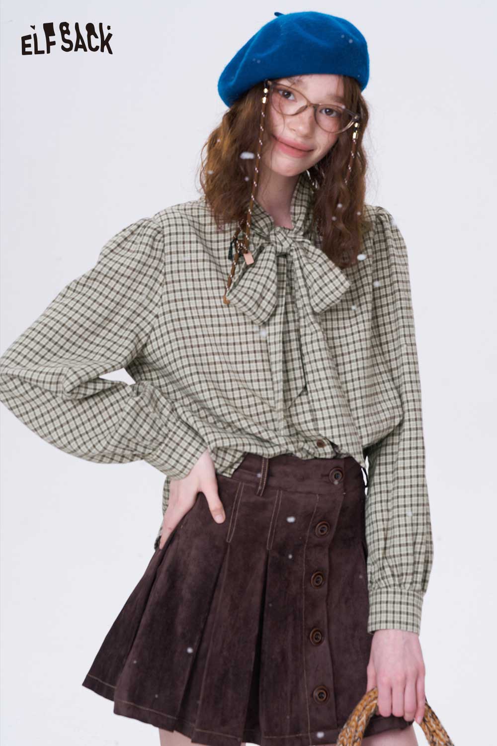 ELFSACK preppy bow tie blouse for women in checkered design, paired with a stylish skirt