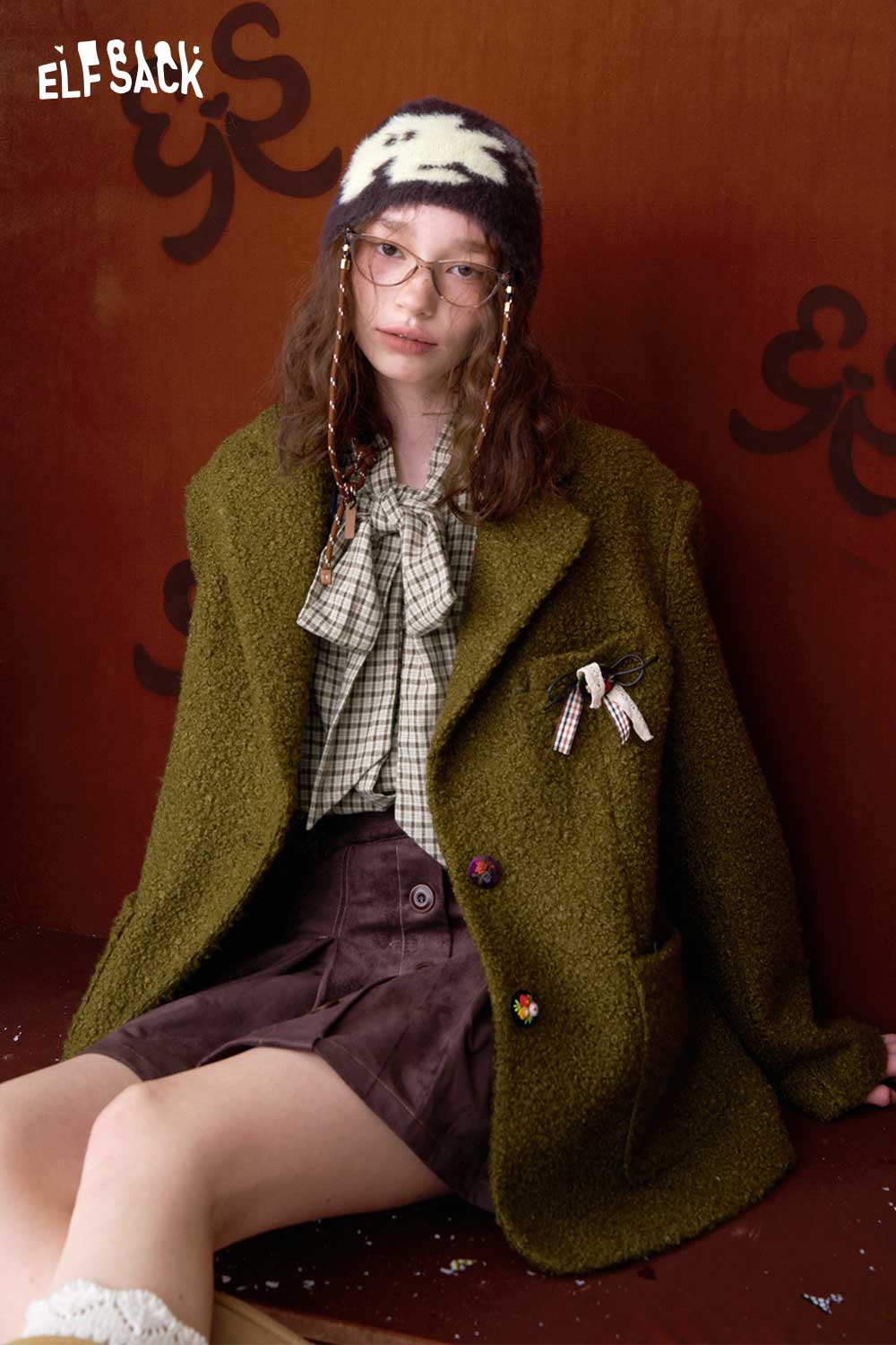 ELFSACK preppy bow tie blouse for women styled with a cozy green jacket and a stylish hat