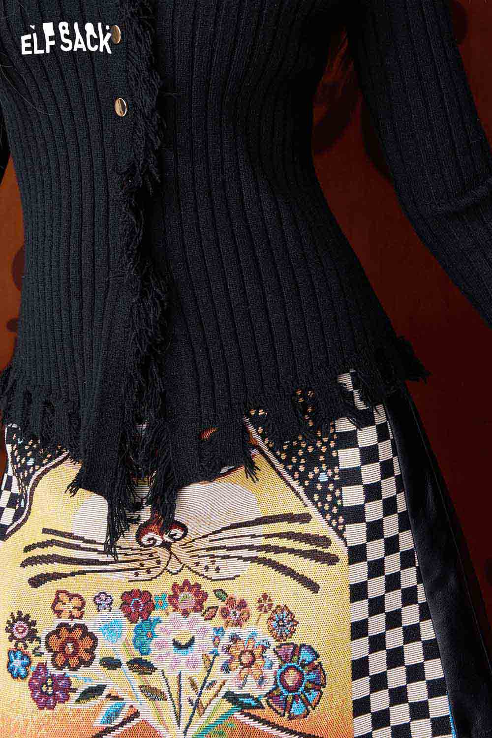 ELFSACK slim fit heart logo knit sweater with a distinctive ripped hem and stylish detailing