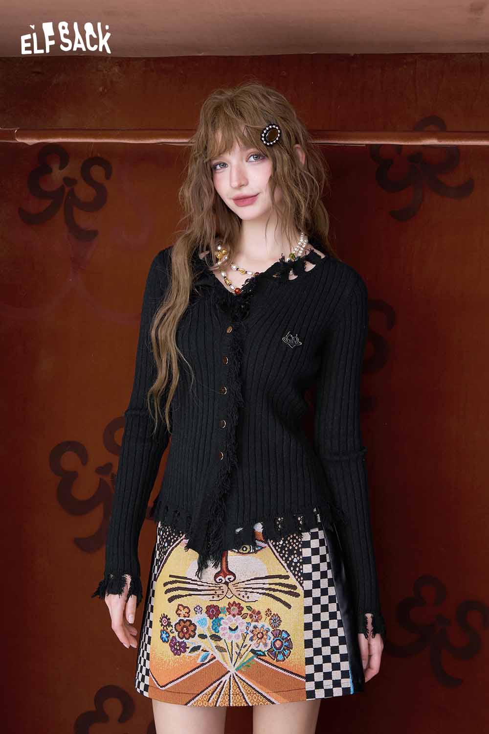 ELFSACK slim fit heart logo knit sweater in black with button details and stylish frayed edges