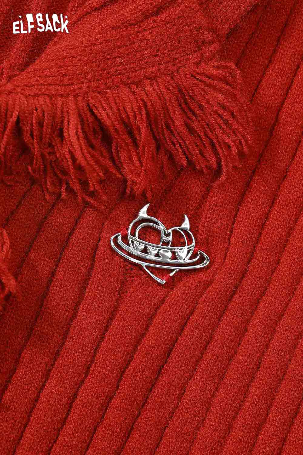 Close-up of ELFSACK slim fit heart logo knit sweater in red with fringe detailing