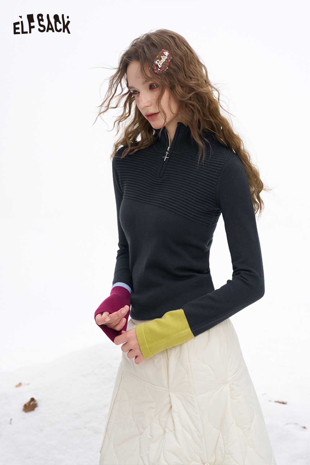 ELFSACK soft contrast sleeve knitwear with a high neckline and stylish colorful sleeves
