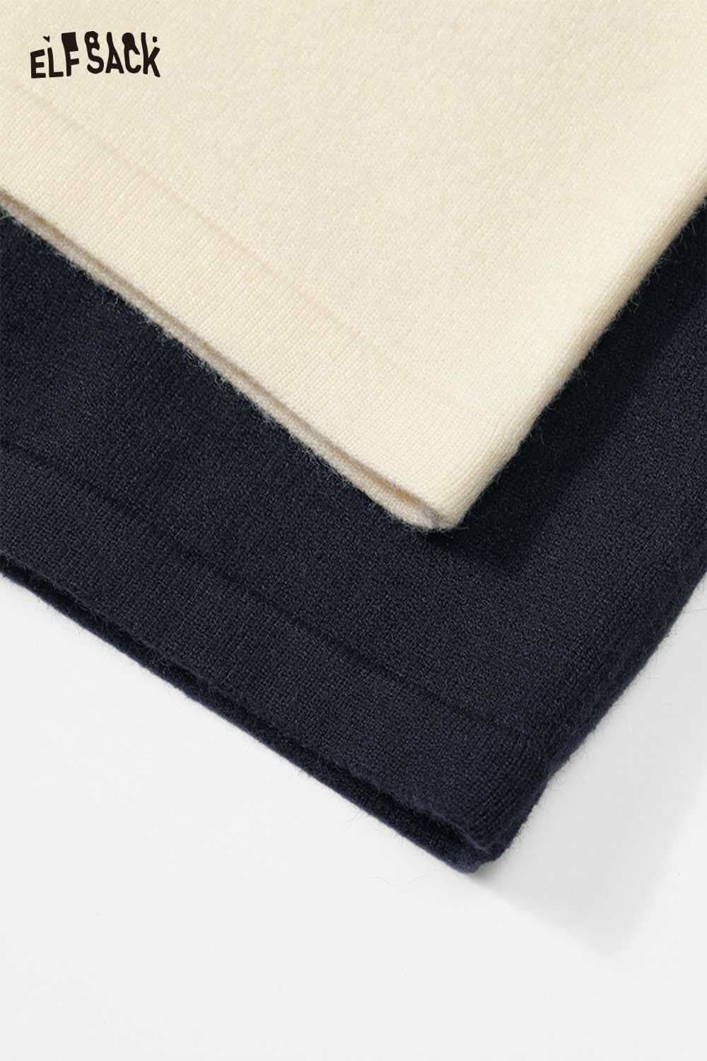 ELFSACK soft contrast sleeve knitwear in cream and navy colors, showcasing soft texture and modern style