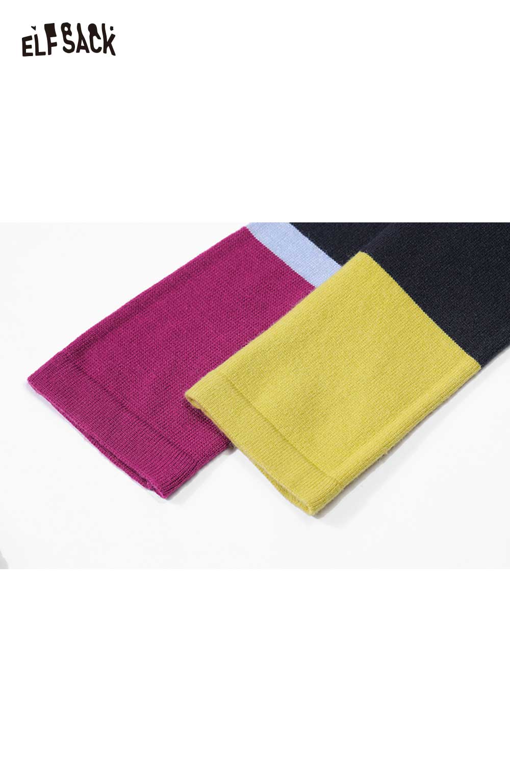 Close-up of soft contrast sleeve knitwear by ELFSACK showcasing vibrant color blocks and soft texture