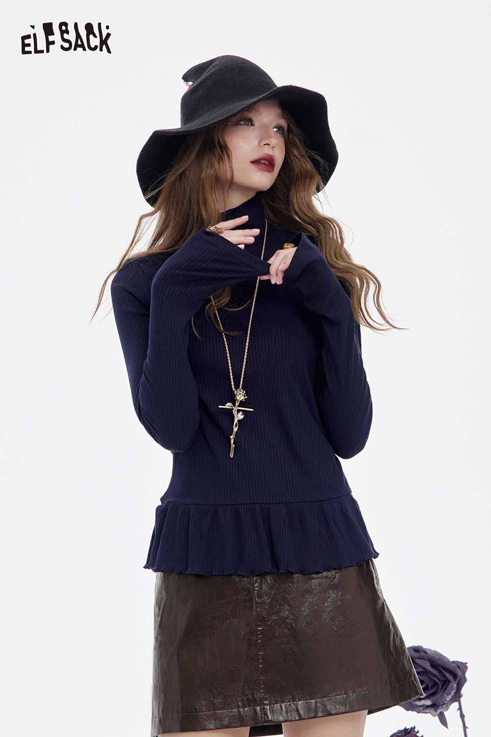 Stylish ELFSACK soft shiny leather skirt paired with a long-sleeve top and hat for a chic look