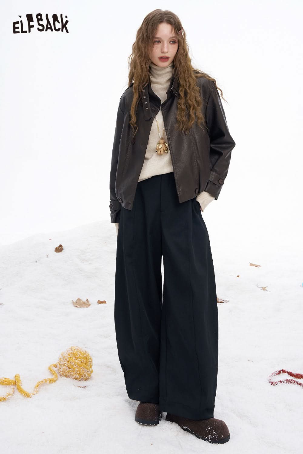 ELFSACK women's wide leg floor length pants in black paired with a stylish jacket and sweater