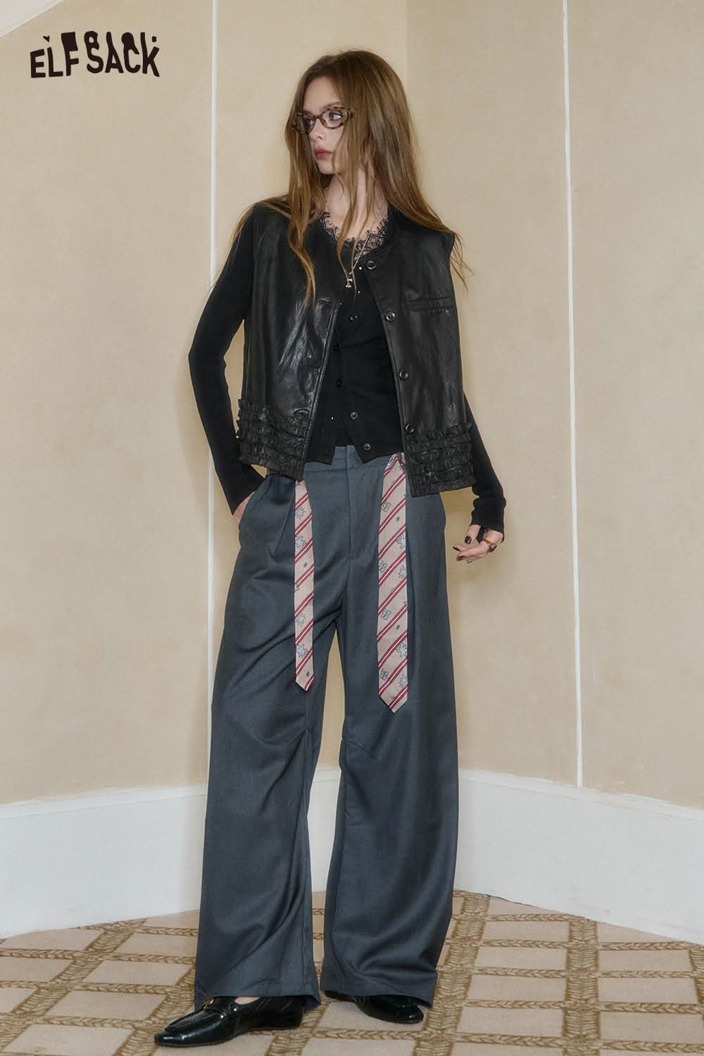 ELFSACK Wool Blend Lace Knit Top styled with fashionable black leather vest and wide trousers