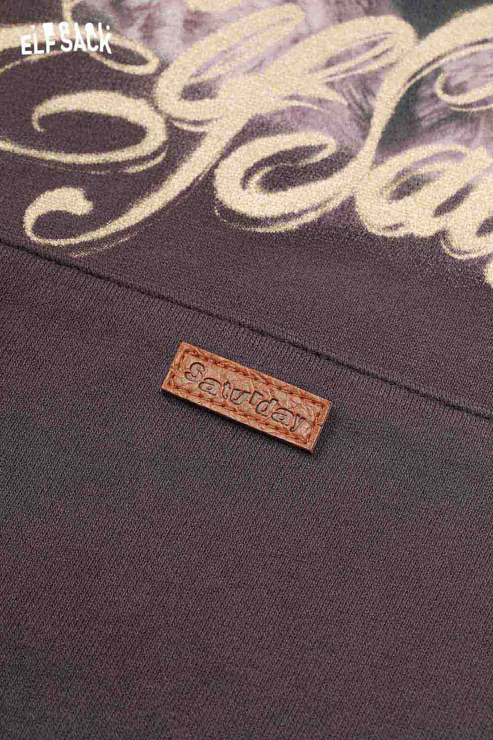 ELFSACK vintage cartoon graphic hoodie featuring a stylish design and soft fabric for casual wear