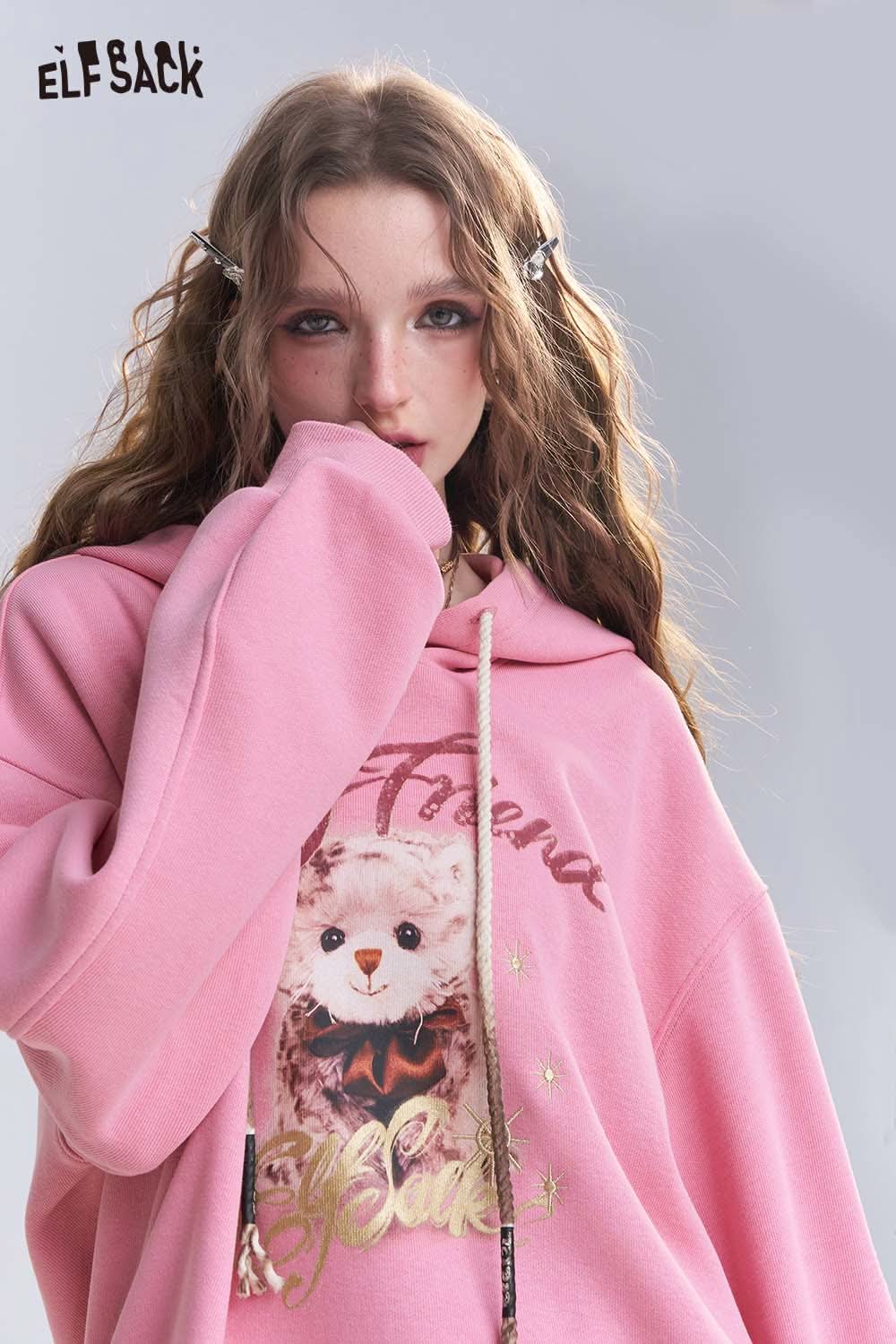 ELFSACK vintage cartoon graphic hoodie in pink featuring a cute bear design for trendy comfort