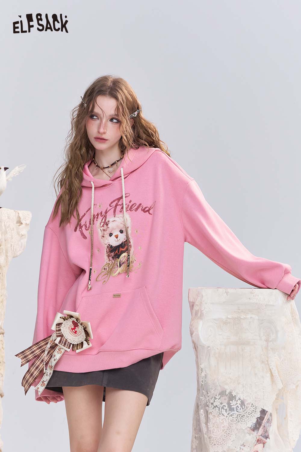 ELFSACK vintage cartoon graphic hoodie in pink featuring a playful design and oversized fit
