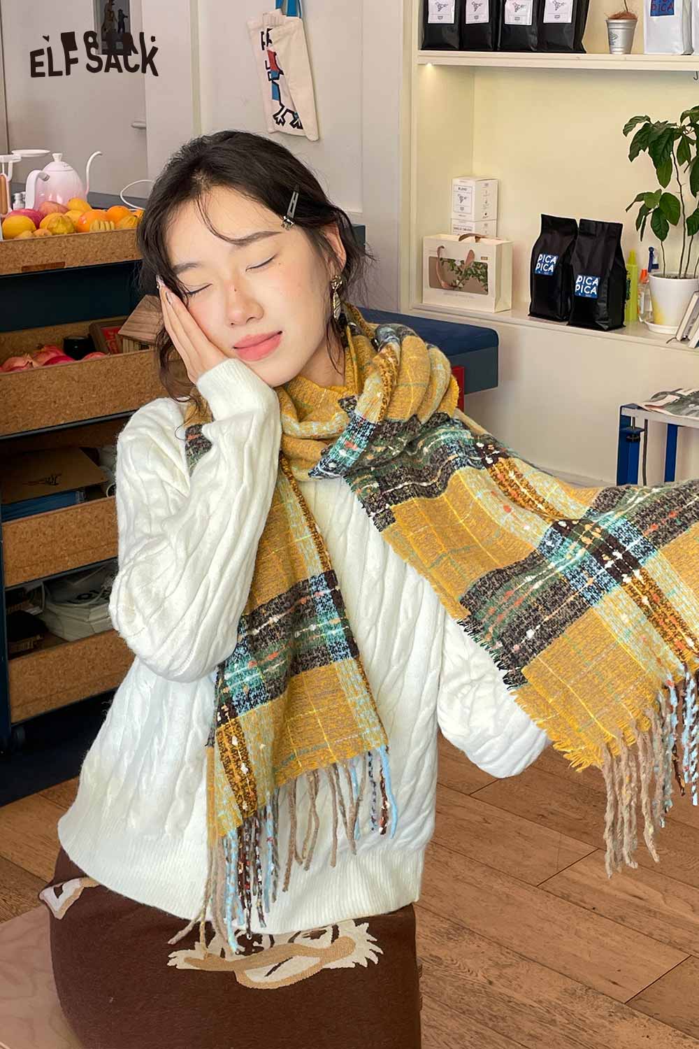 Woman wearing a vintage plaid wool scarf in yellow and green hues, perfect for stylish winter outfits