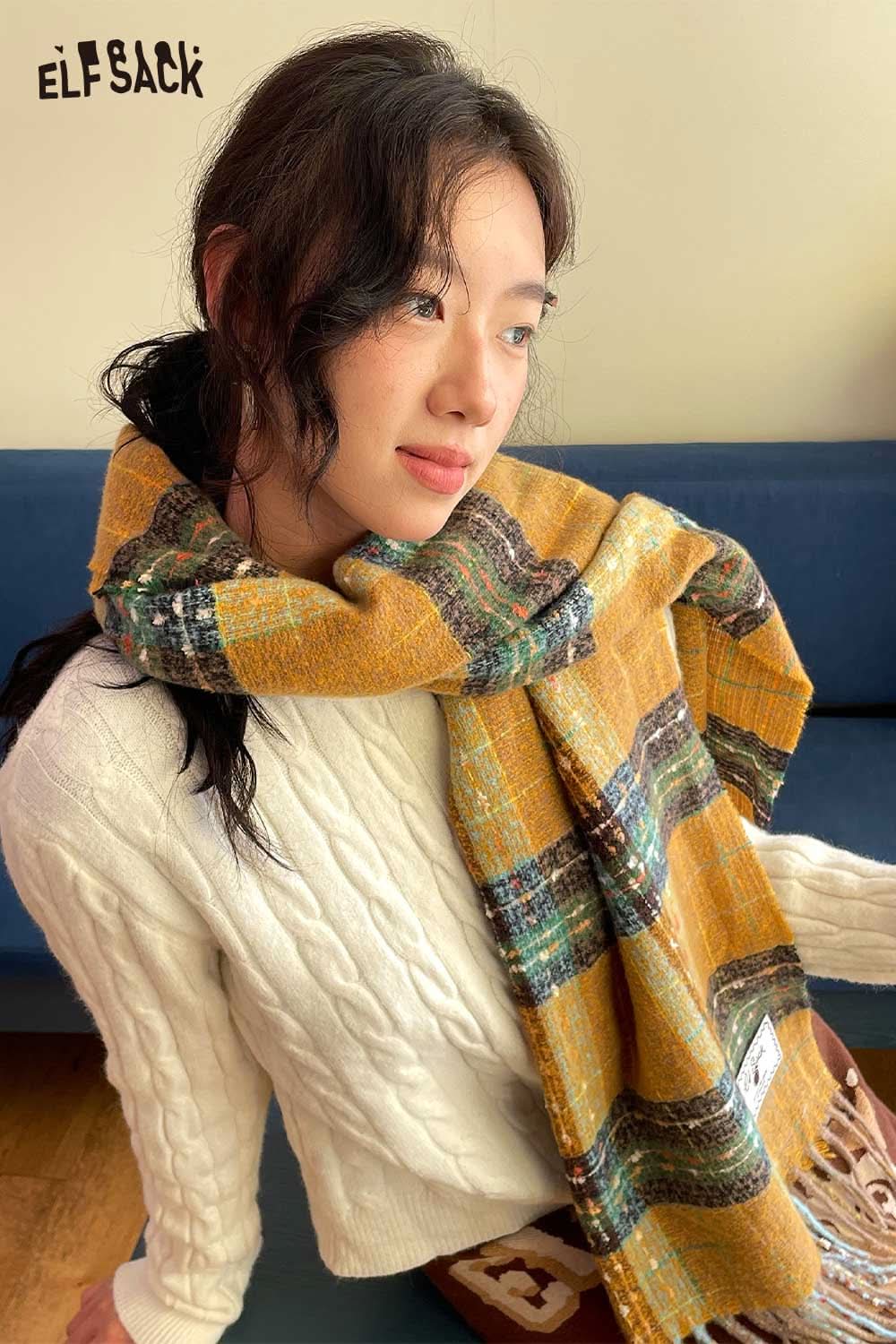 ELFSACK vintage plaid wool scarf in yellow and green draped stylishly over a model's shoulder