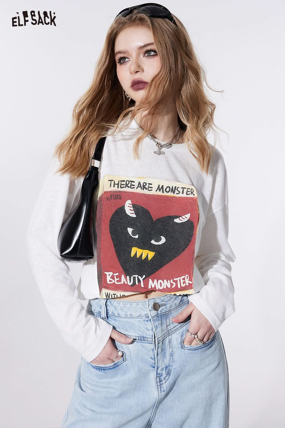 ELFSACK white long sleeve T-shirt with graphic print featuring monster heart design