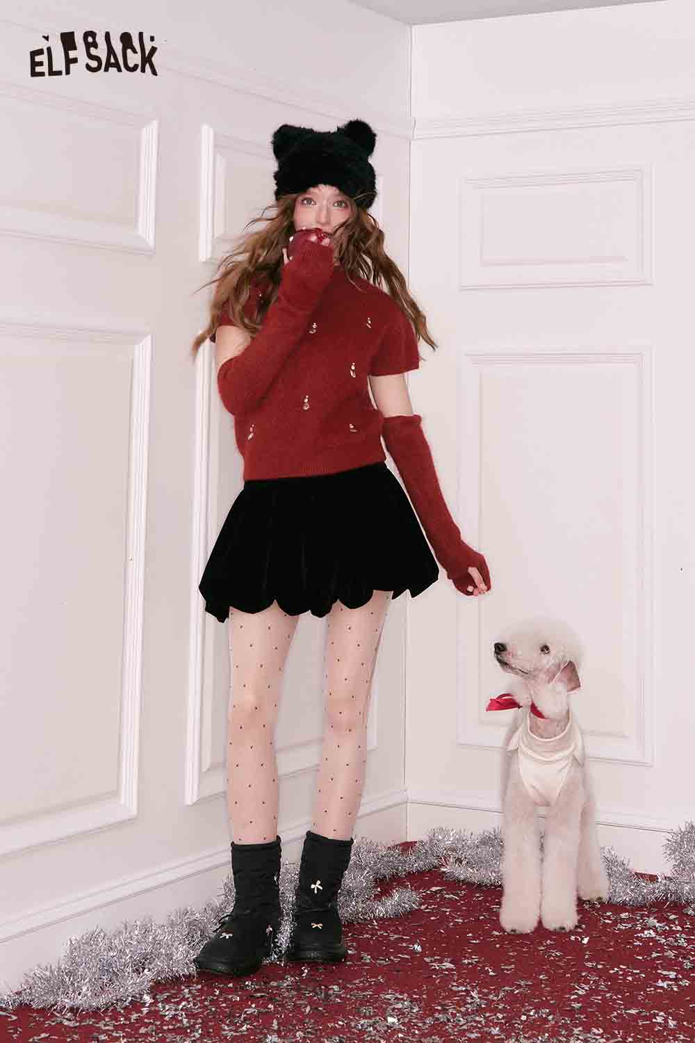 ELFSACK Christmas rhinestone sweater for women styled with a skirt and paired with a pet dog