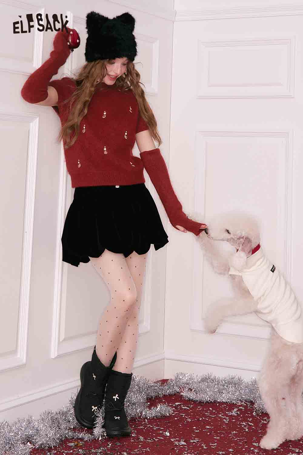 ELFSACK Christmas rhinestone sweater for women styled with a black skirt and festive accessories