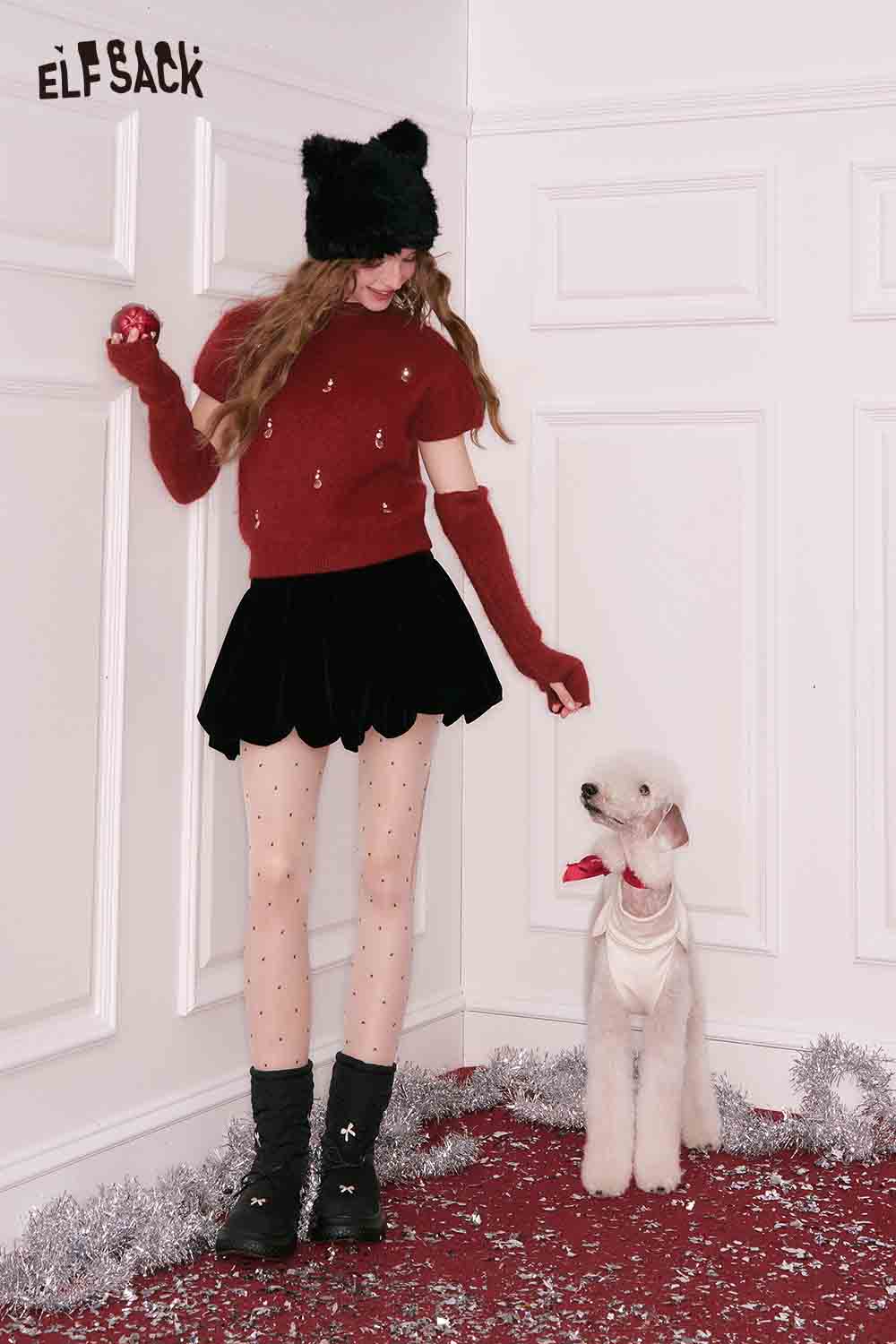 ELFSACK Christmas rhinestone sweater for women in red, styled with a black skirt and accessories