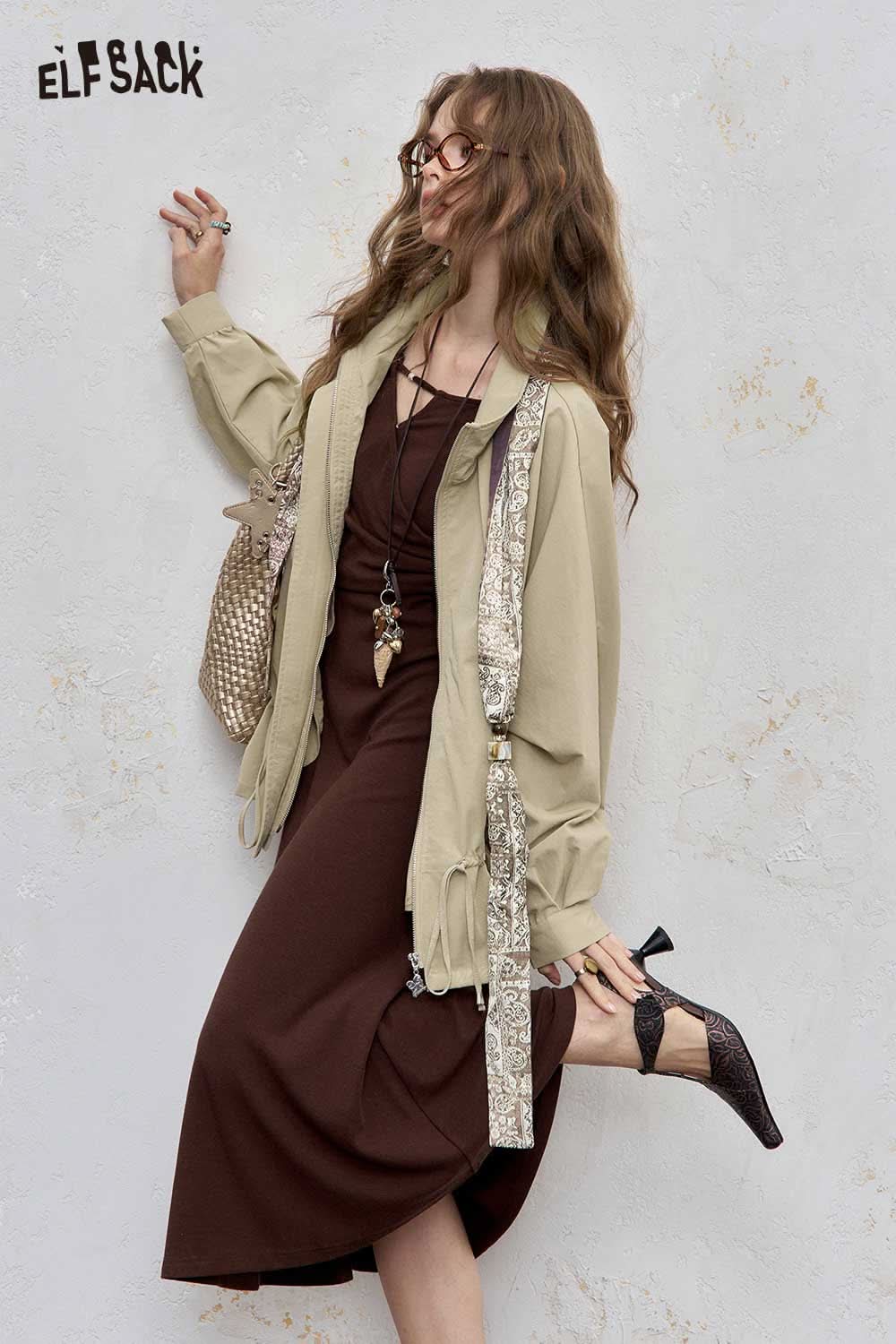 ELFSACK minimalist short jacket for women styled over a brown dress with accessories and elegant shoes