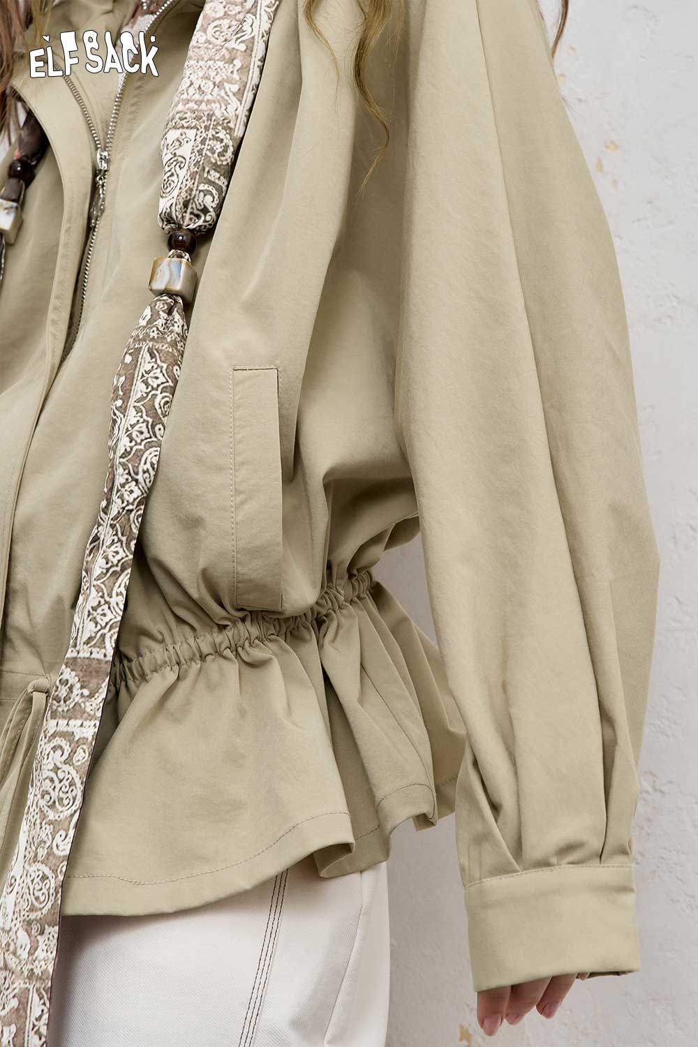 ELFSACK minimalist short jacket for women in beige with an elastic hem and stylish design