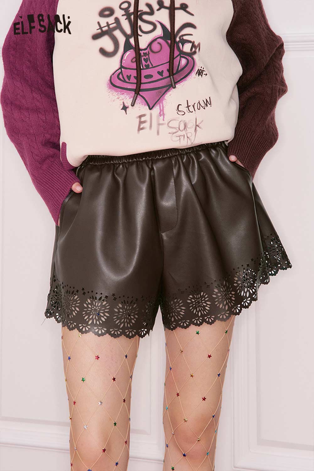 ELFSACK women's PU leather shorts with a scalloped hem and elastic waistband for a trendy look