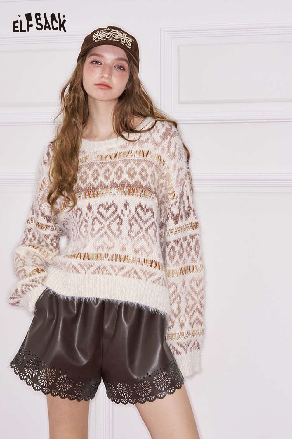 ELFSACK women's PU leather shorts with scalloped hem paired with a cozy patterned sweater