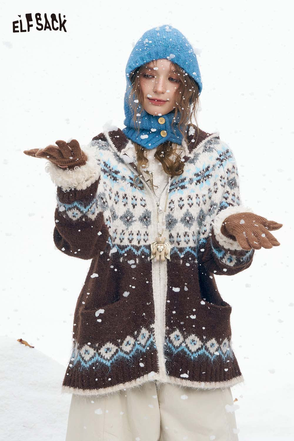 ELFSACK women's Christmas hooded sweater with festive design, cozy fabric, and pockets, perfect for winter wear.