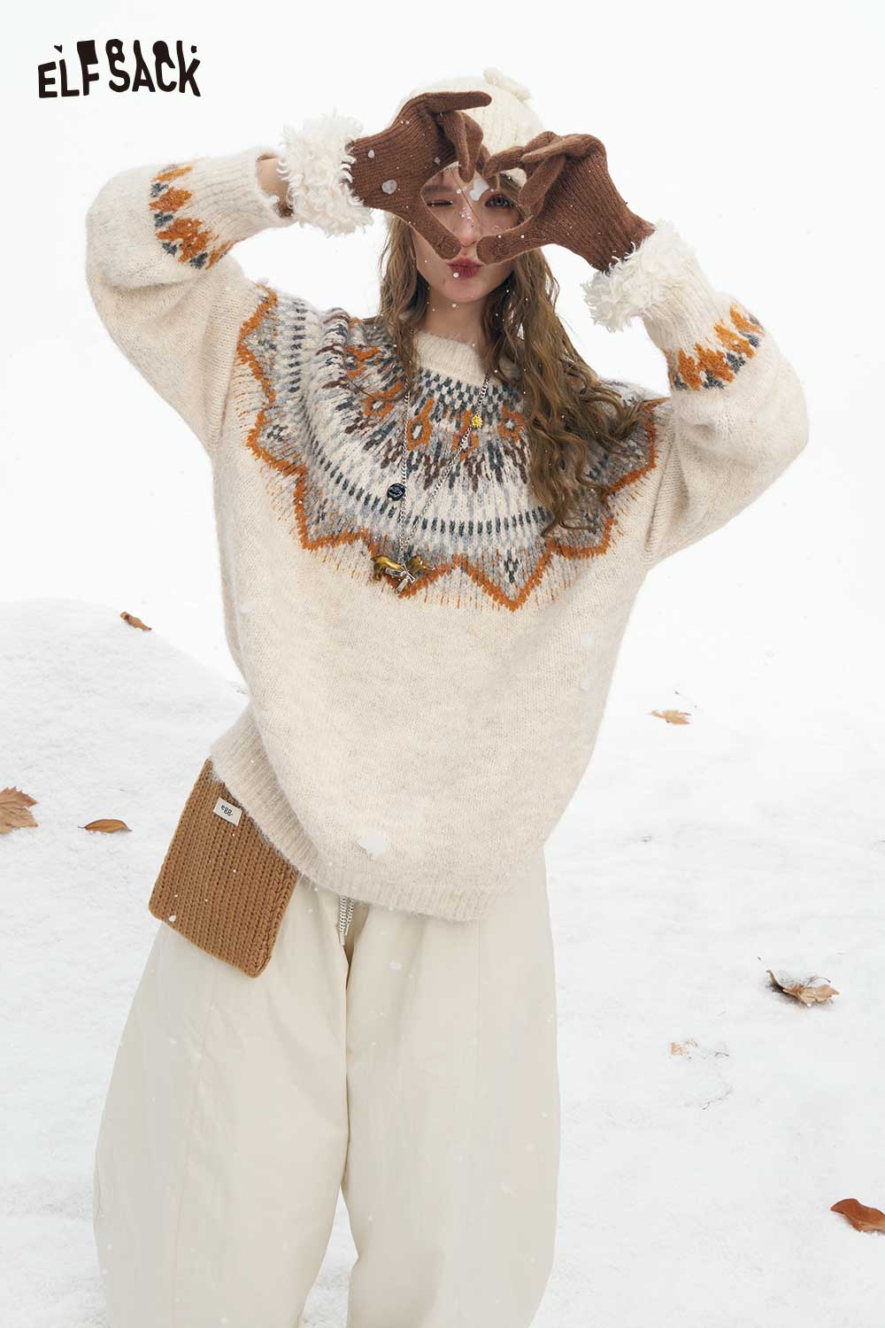 ELFSACK women's Christmas stripe sweater with a cozy design and festive colors for winter wear